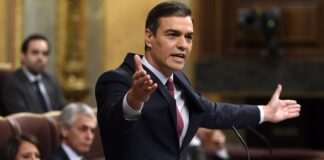 Spanien är det första landet som behandlar Covid ”som influensa” mitt i en ökning av infektioner